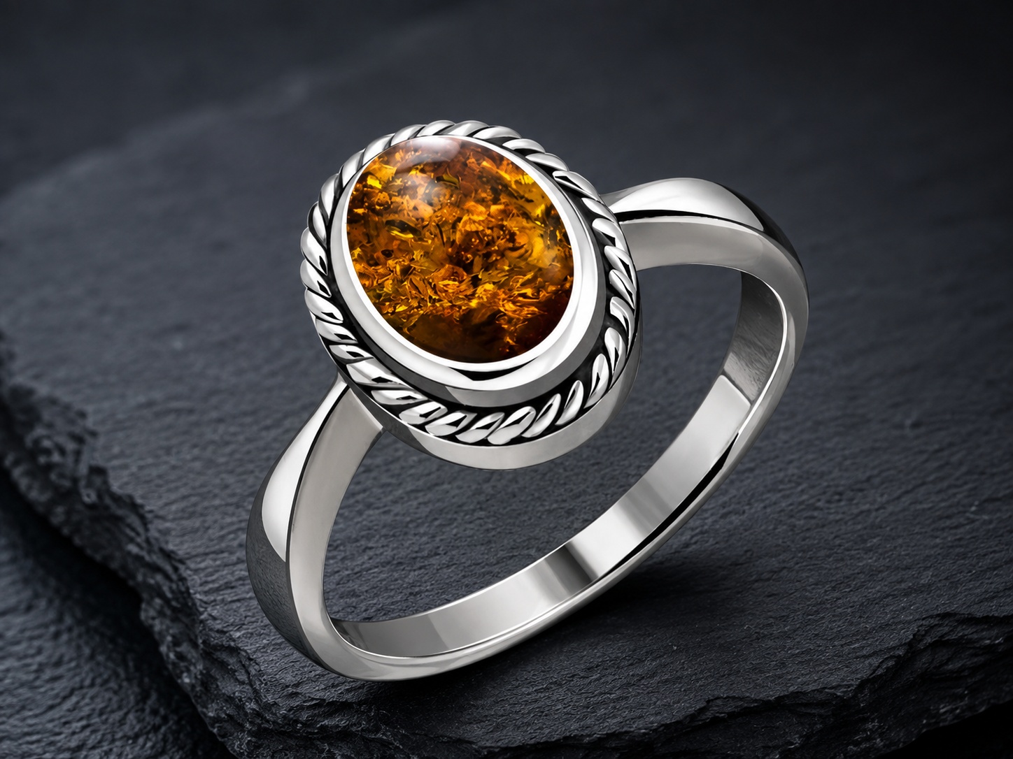 Sterling silver amber ring representing The Marlow Menagerie