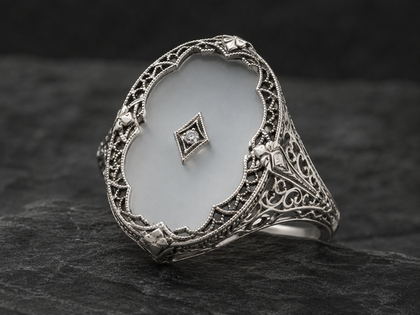 Art Deco camphor glass filigree ring representing The Marlow Heritage Collection